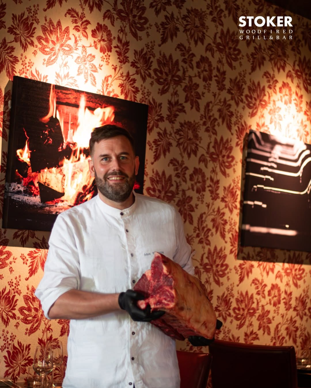 Chef presenting a cut of beef
